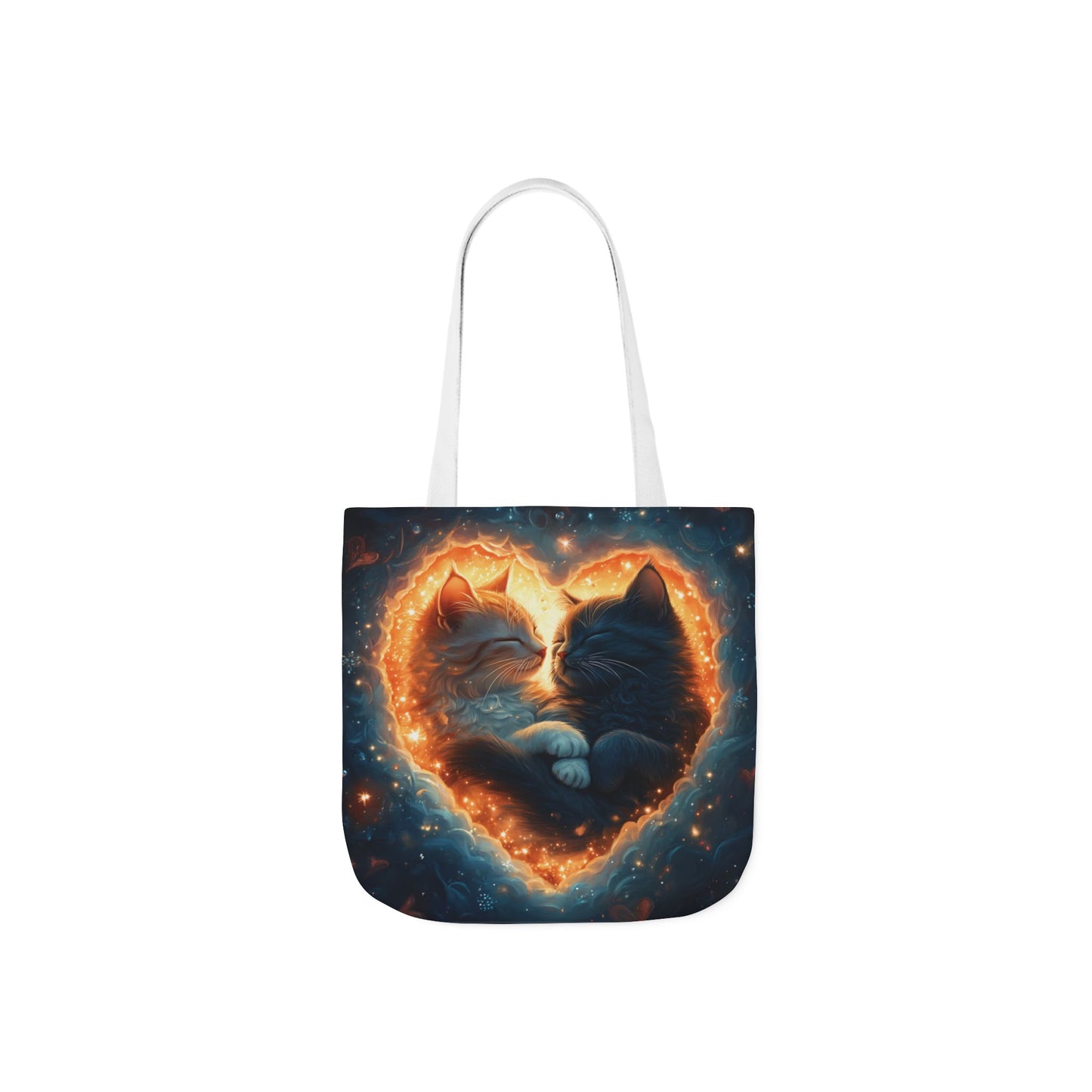 A vibrant heart composed of swirling stardust cradles two cuddling cats against a backdrop of a deep, colorful galaxy. This all-over print design covers the entirety of the Celestial Embrace Tote Bag.