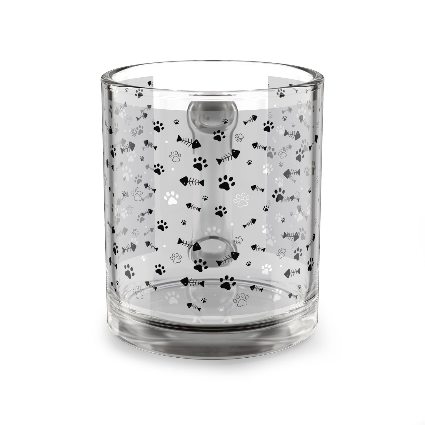 Clear glass mug with paw prints and fishbones all over print pattern.