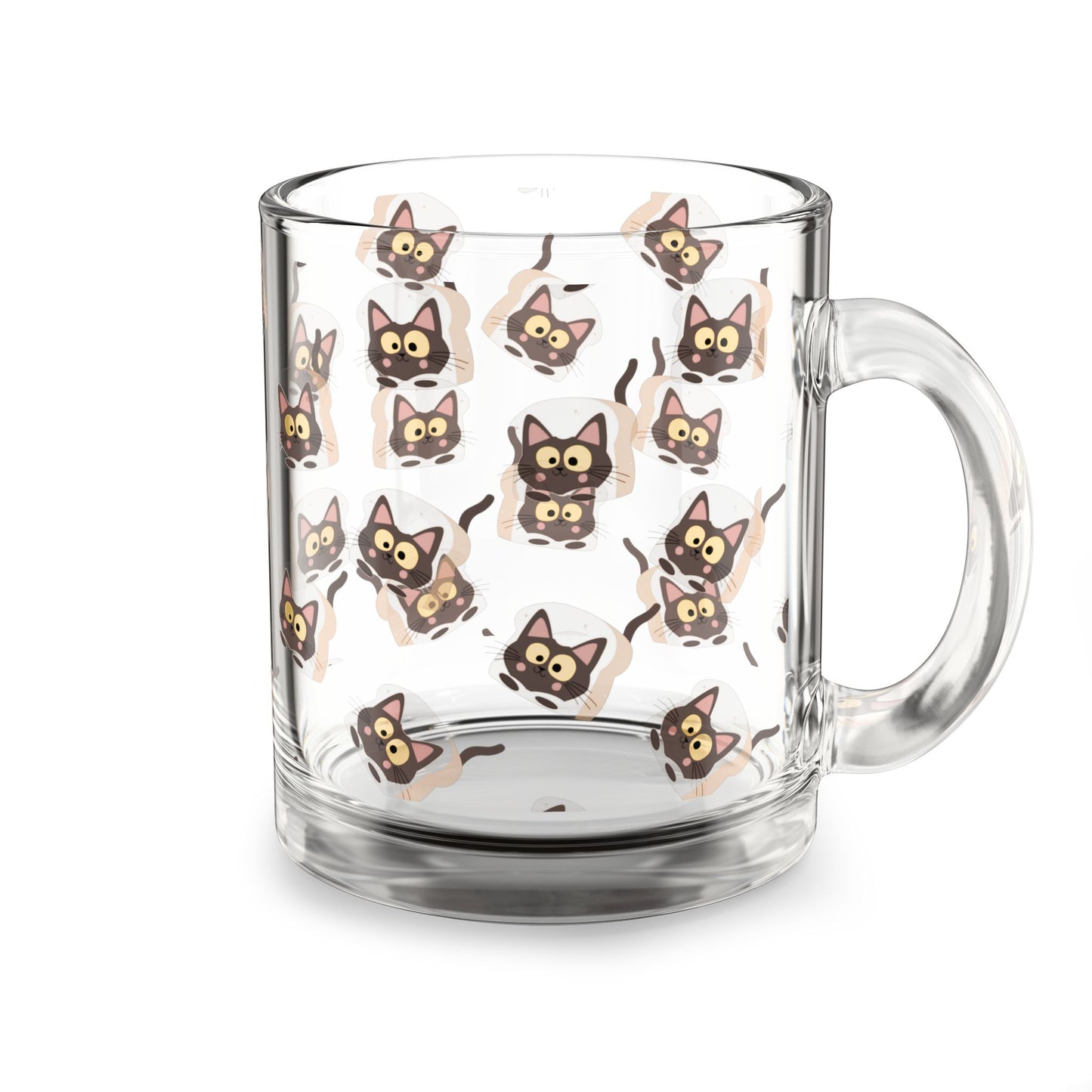 Clear glass "Morning Meow" mug with an all-over print of a wide-eyed brown cat peering its head through a slice of toast.