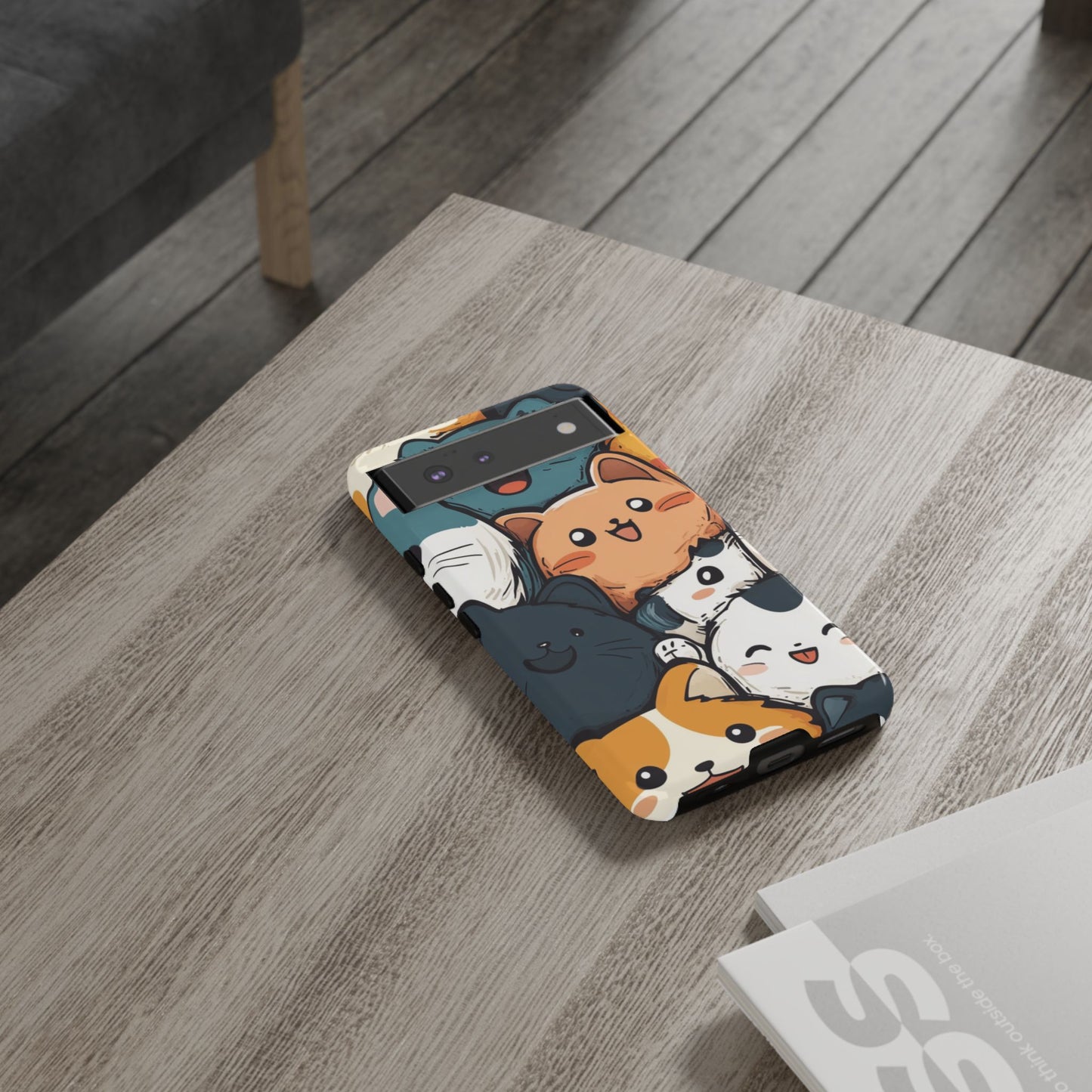 Multi-colored phone case with clustered, smiling Kawaii-style cat faces.