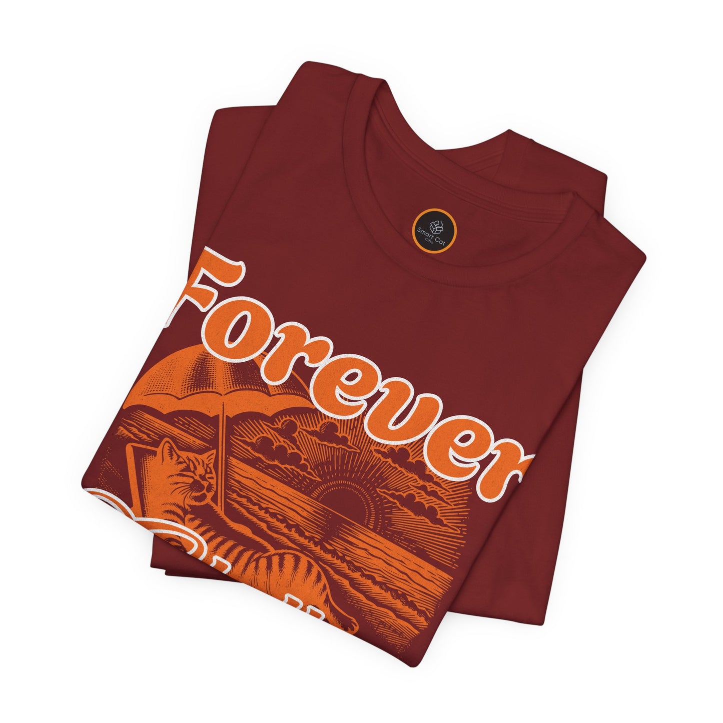 A graphic on the "Forever Chillin'" T-shirt shows a relaxed cat lounging in a beach chair on a sandy beach, with ocean waves and a setting sun visible in the background.