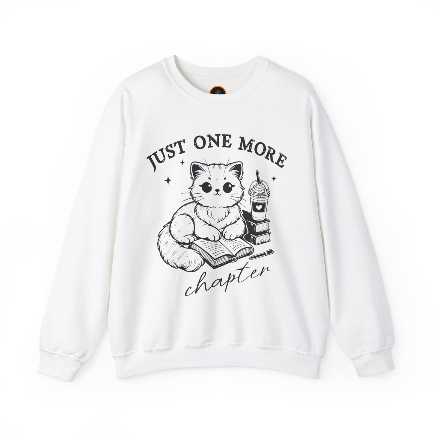 Just One More Chapter" light gray crewneck sweatshirt with a graphic of a cat reading a book next to a Frappuccino on a stack of books.