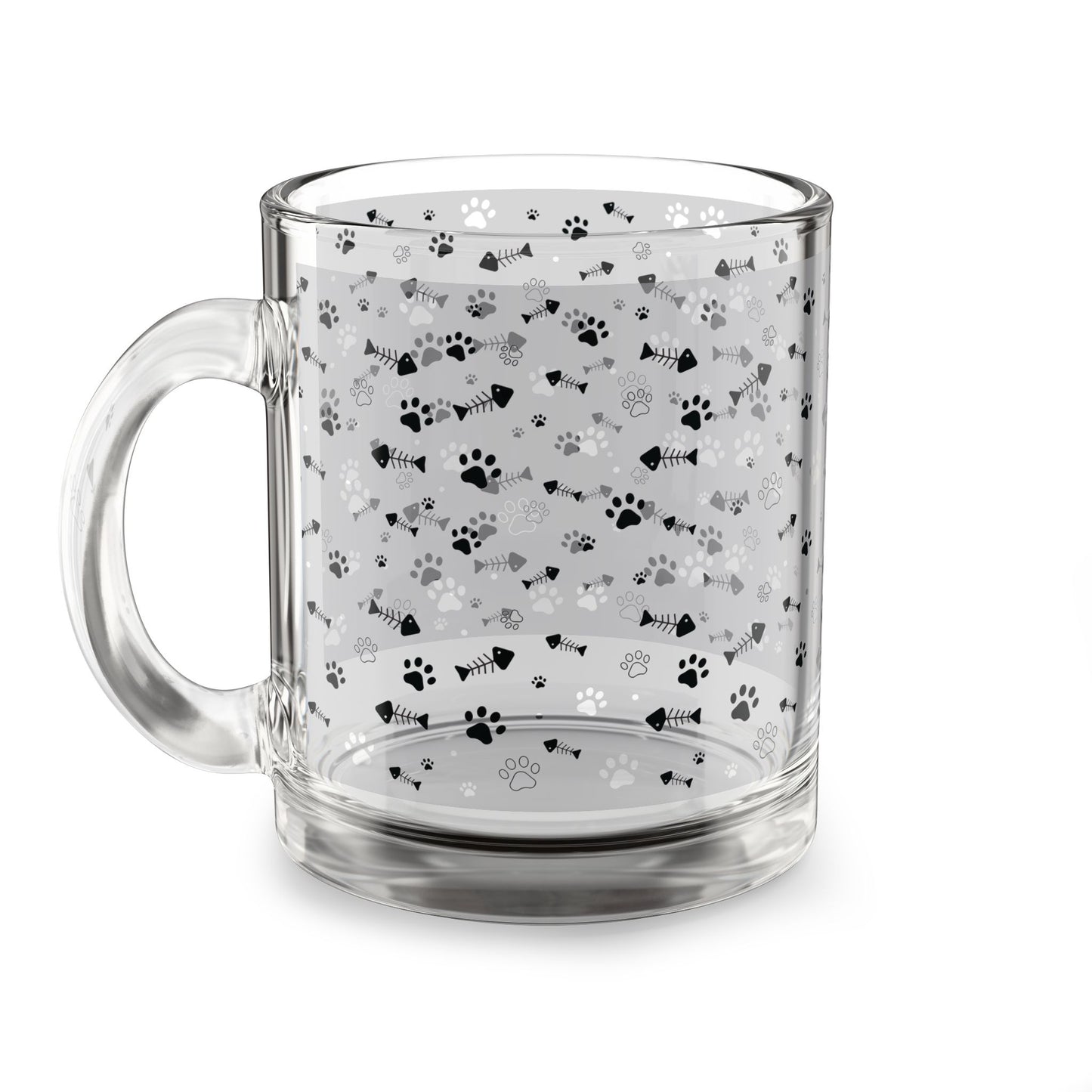 Clear glass mug with paw prints and fishbones all over print pattern.