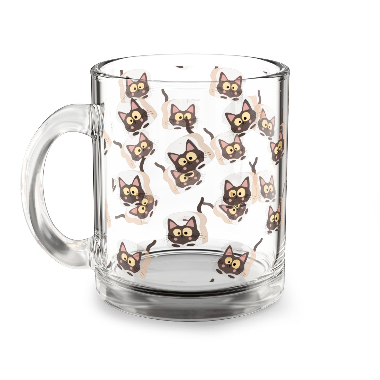 Clear glass "Morning Meow" mug with an all-over print of a wide-eyed brown cat peering its head through a slice of toast.