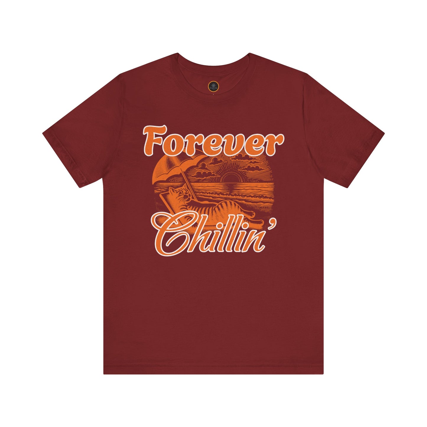 A graphic on the "Forever Chillin'" T-shirt shows a relaxed cat lounging in a beach chair on a sandy beach, with ocean waves and a setting sun visible in the background.