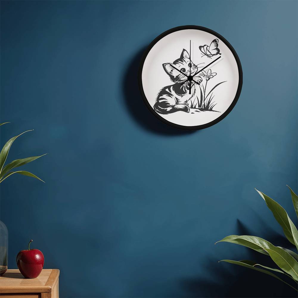 A clock featuring a line art design of a playful encounter between a curious kitten and a gentle butterfly