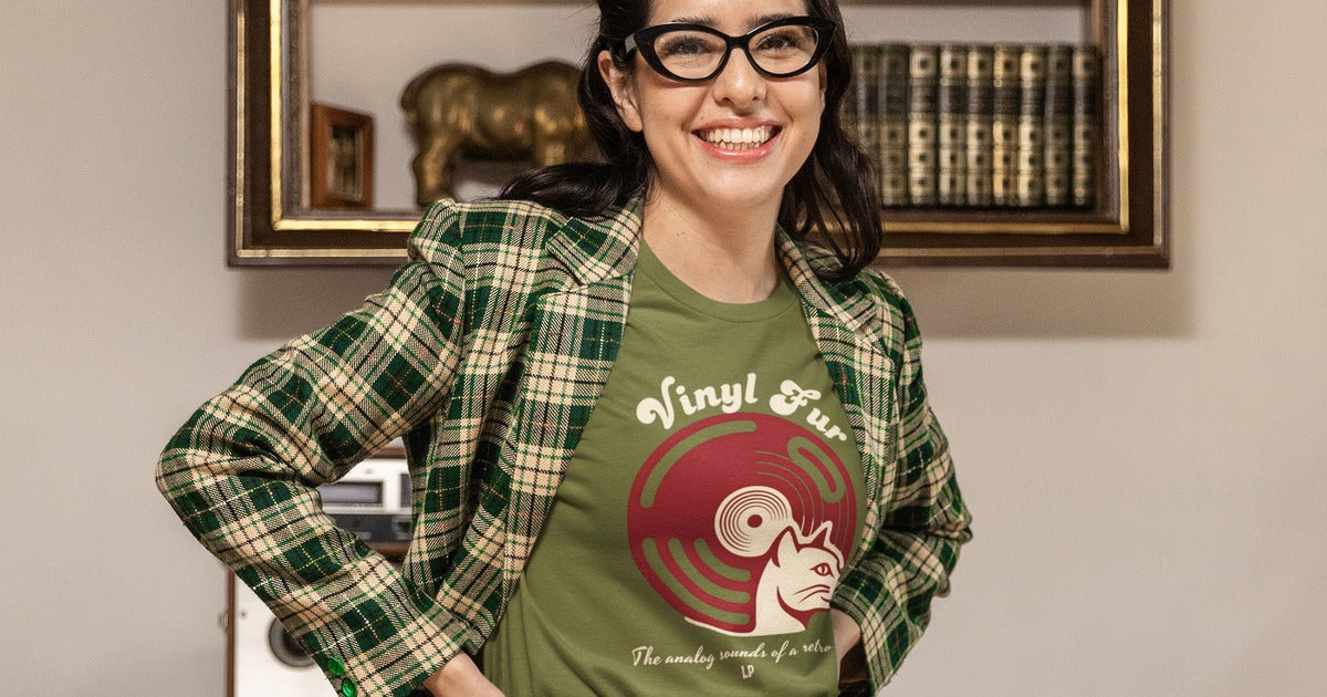 Model wearing olive Vinyl Fur t-shirt with retro vinyl record graphic