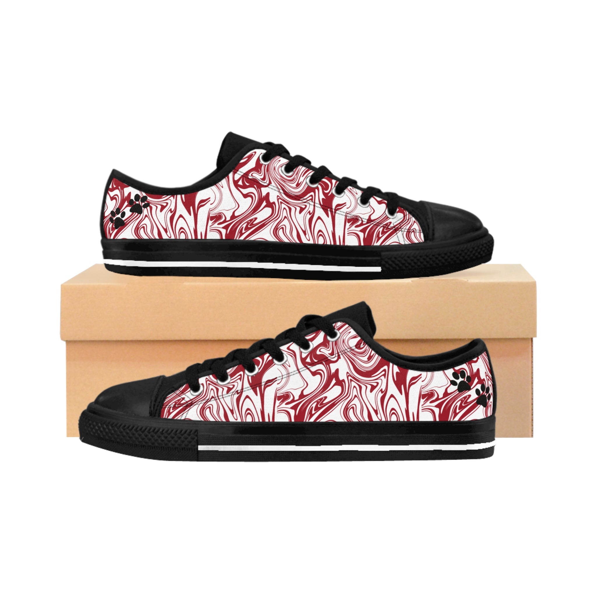 Candy Swirl women's sneakers: white with red swirl all-over print, two black paw prints on heel.