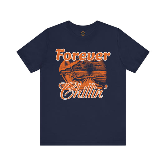 A graphic on the "Forever Chillin'" T-shirt shows a relaxed cat lounging in a beach chair on a sandy beach, with ocean waves and a setting sun visible in the background.