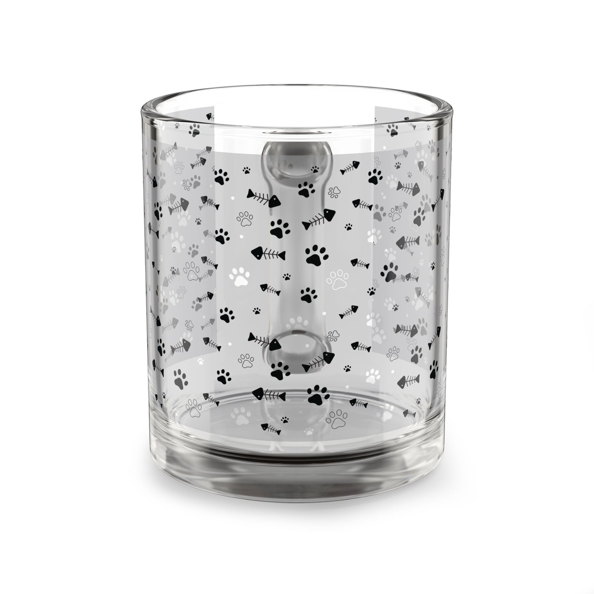 Clear glass mug with paw prints and fishbones all over print pattern.