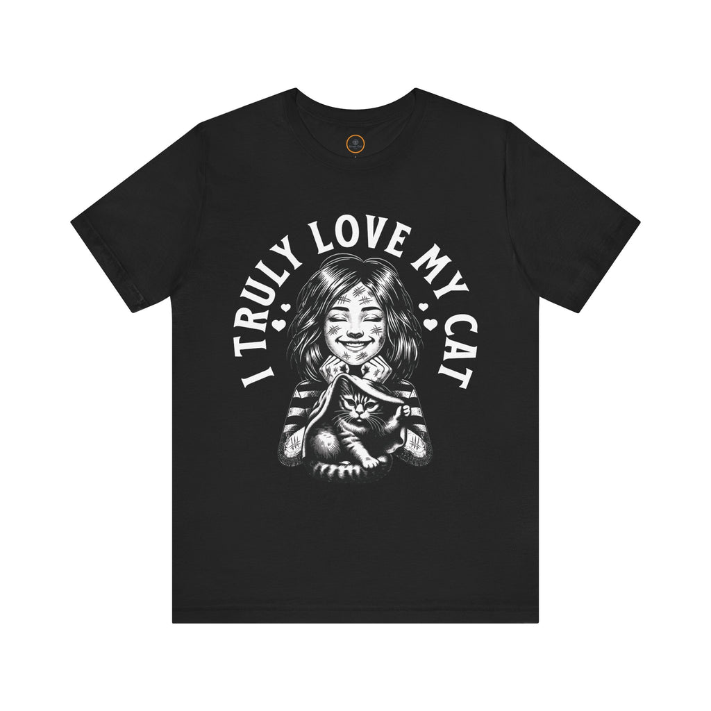 Humorous graphic tee design showing a smiling woman covered in cat scratches, with a smug cat nearby and hearts, above the text 'I Truly Love My Cat'."
