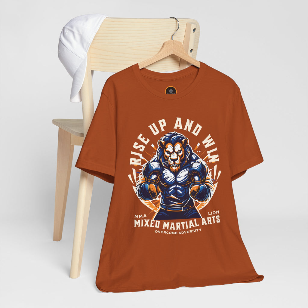 Orange t-shirt featuring a powerful lion graphic in a ready-to-fight stance with inspiring 'Rise Up and Win' text.