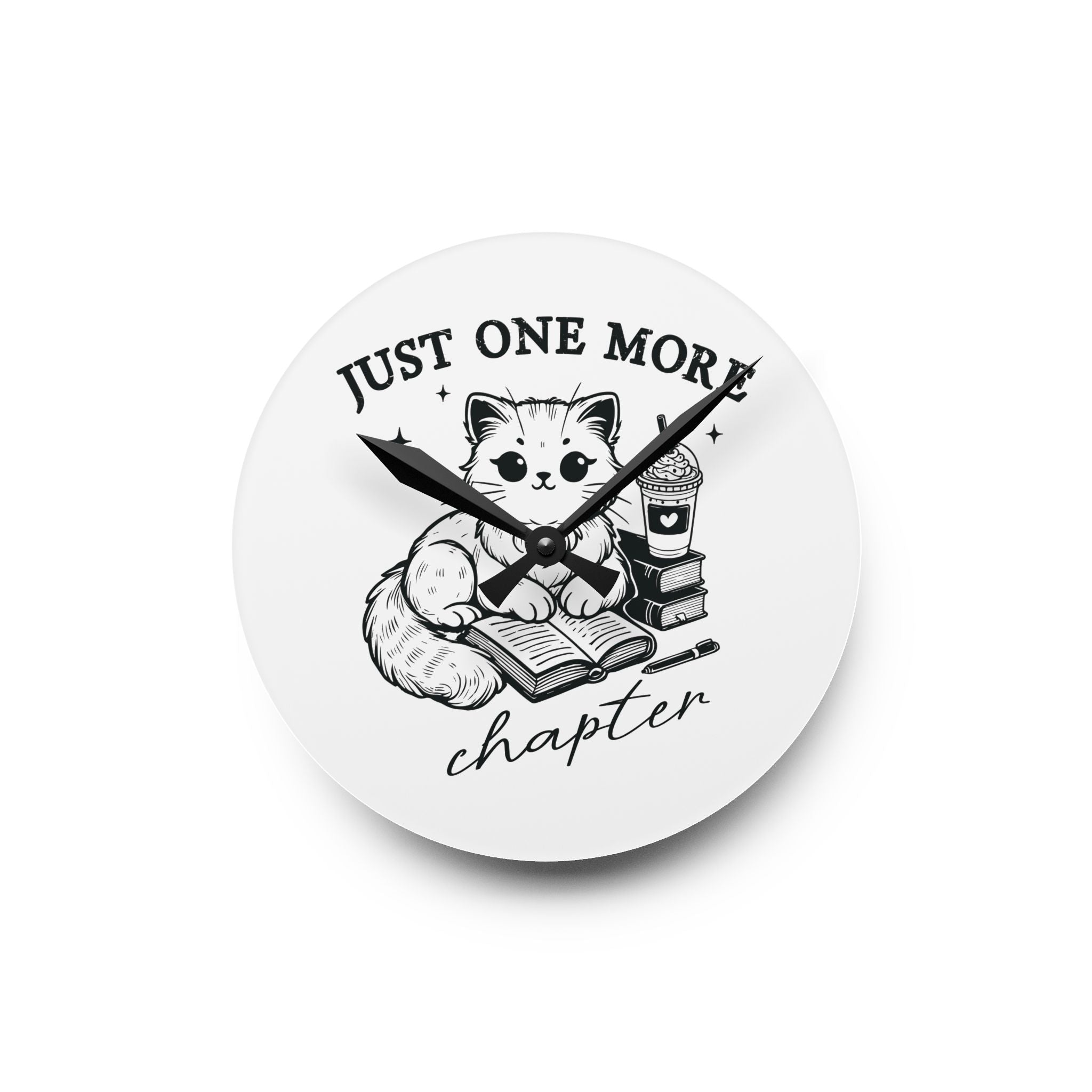 Line art graphic on the "Just One More Chapter" Acrylic Wall Clock depicting a cat reading an open book beside a book stack topped with a beverage. The words "just one more" are above, and "chapter" in script is below.