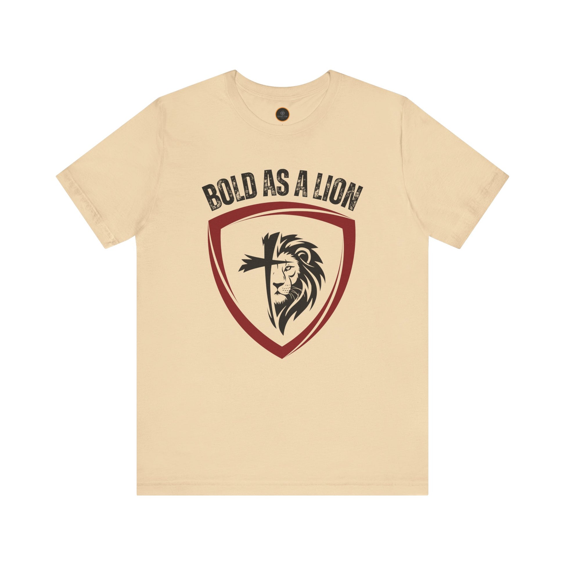 The Bold As A Lion t-shirt: Featuring a graphic with half of a lion's face merging into half of a cross within a shield outline. The text "bold as a lion" is printed above the graphic.