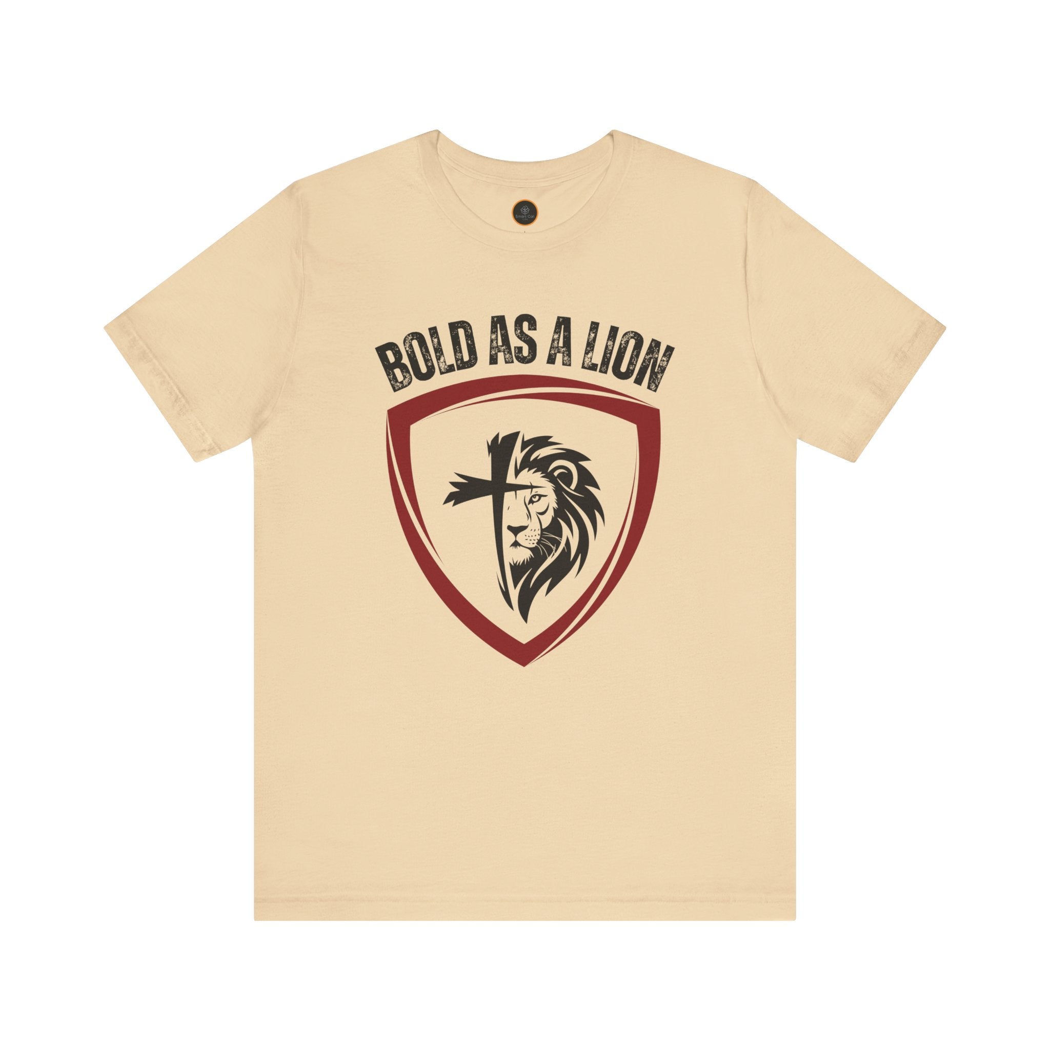 The Bold As A Lion t-shirt: Featuring a graphic with half of a lion's face merging into half of a cross within a shield outline. The text "bold as a lion" is printed above the graphic.