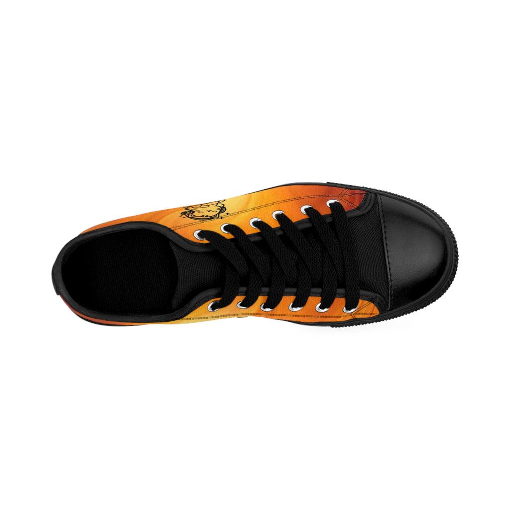 Top view of the Sunburst Vibes women's sneakers: swirling orange all-over print, line art of cat with headphones.