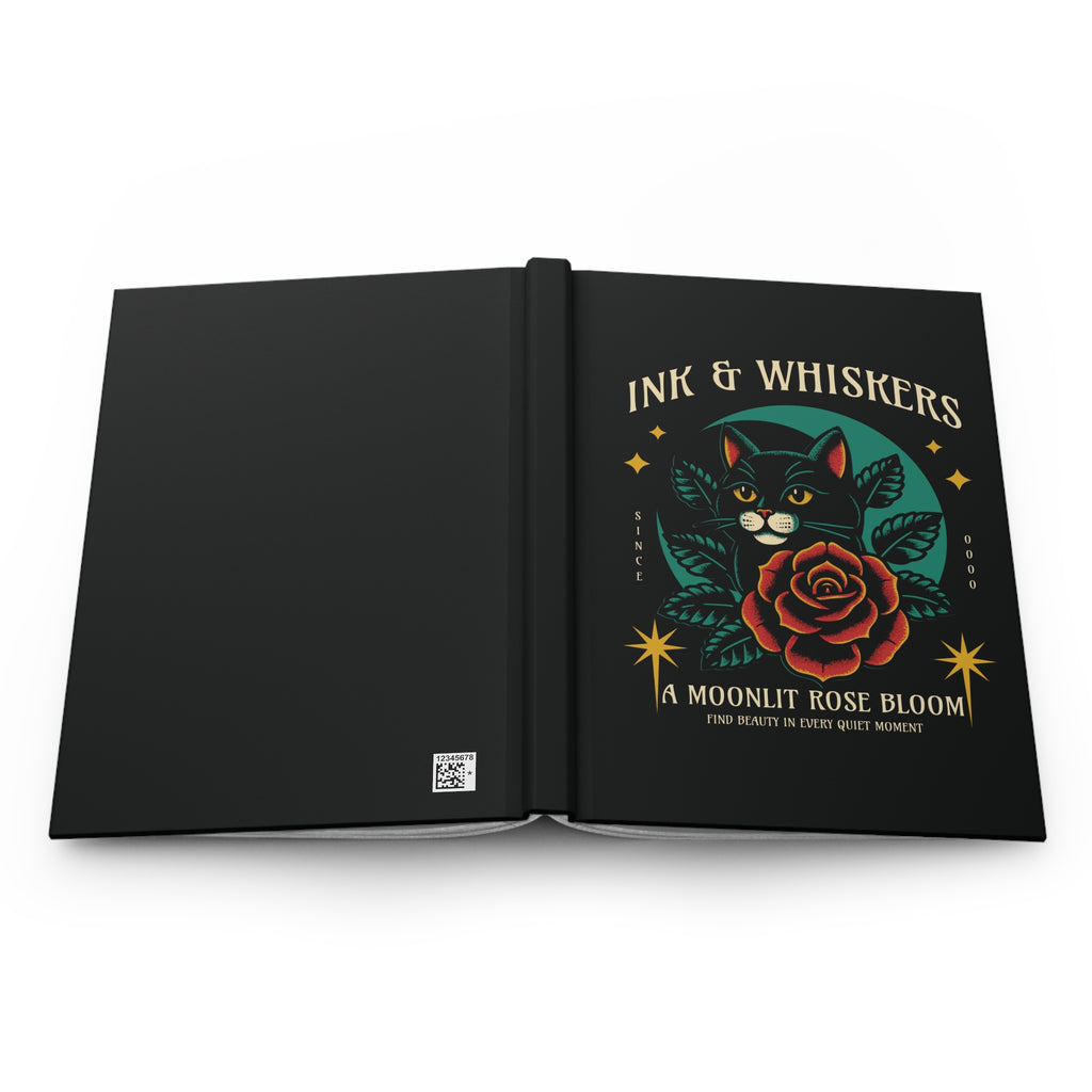 Black notebook with a cat and rose design on the cover, featuring the text 'Ink & Whiskers'.