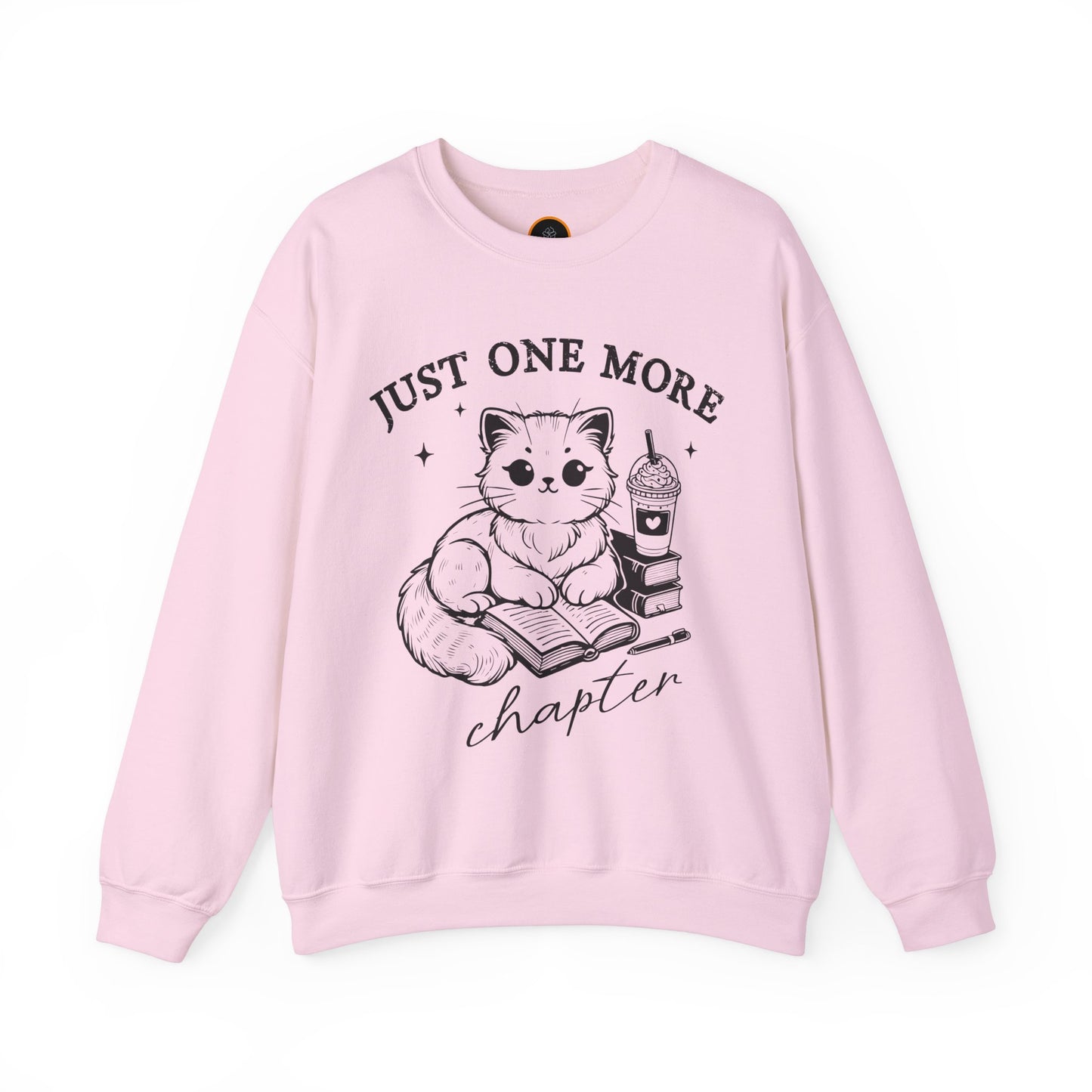 Just One More Chapter" light gray crewneck sweatshirt with a graphic of a cat reading a book next to a Frappuccino on a stack of books.