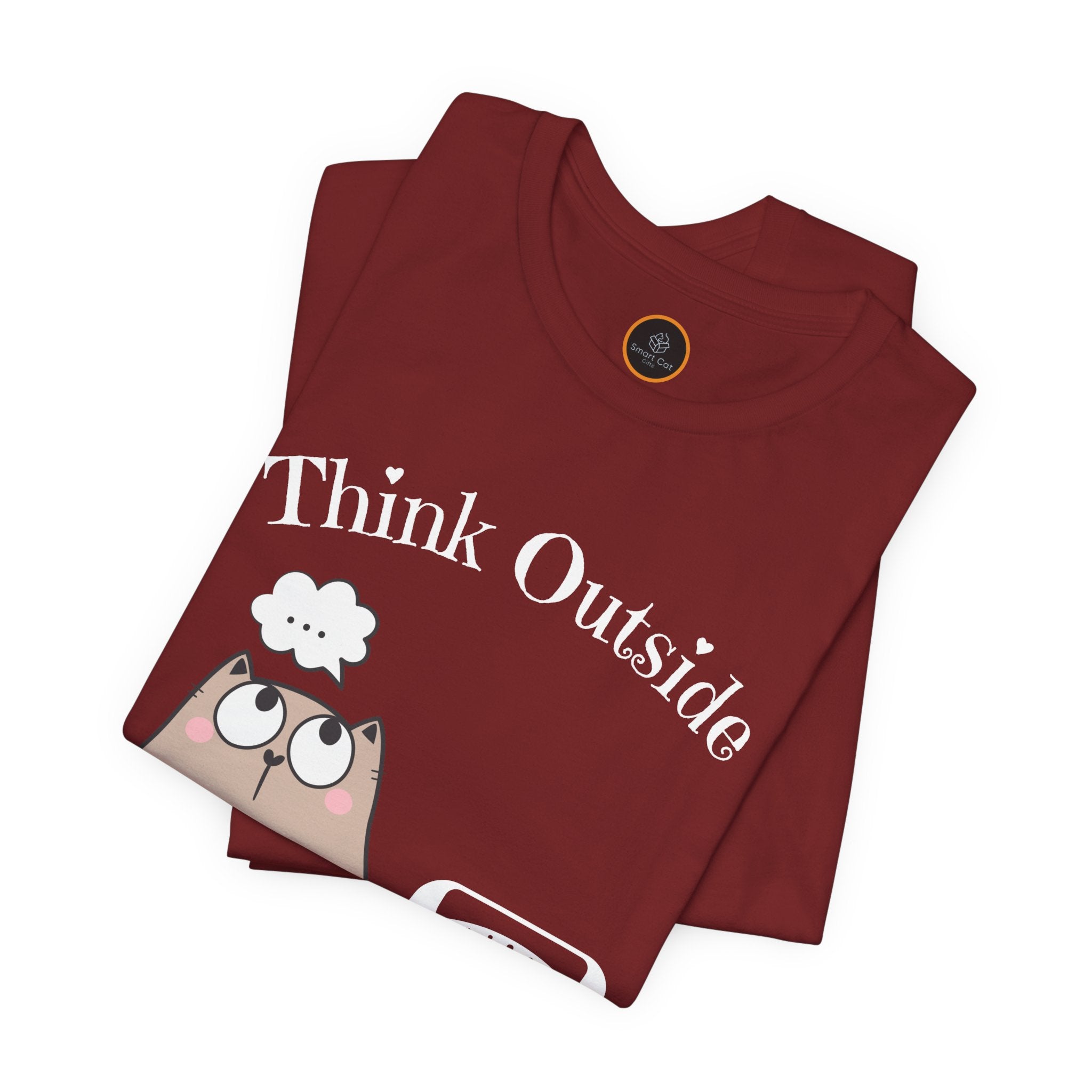 A crew neck t-shirt with the text 'Think Outside The Litter Box' and a graphic of a cat sitting next to a litter box.