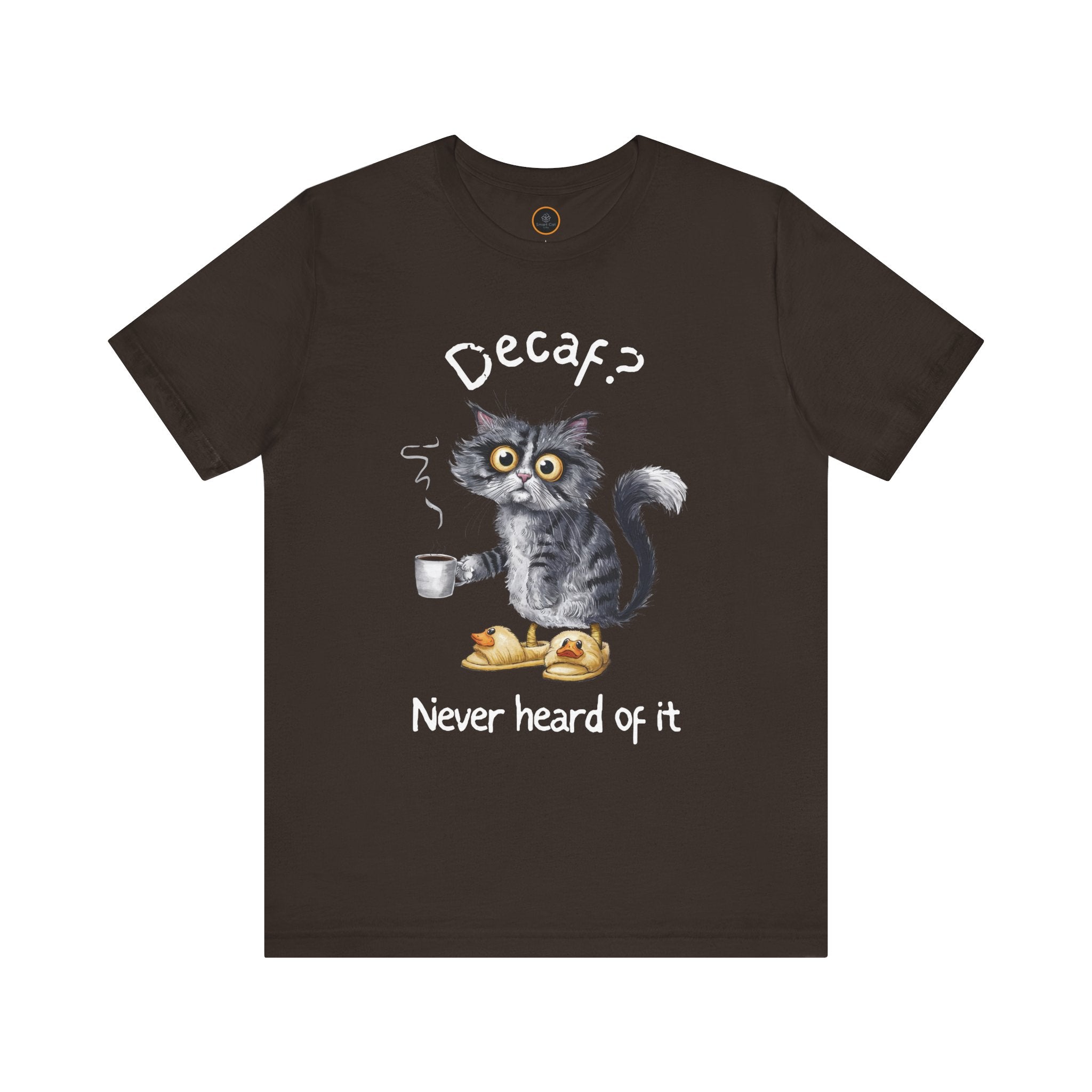 A crew neck t-shirt featuring an exhausted-looking cat wearing yellow slippers with duck faces on them. The cat is holding a steaming mug of coffee. The text on the sweatshirt reads "Decaf? Never Heard of It."