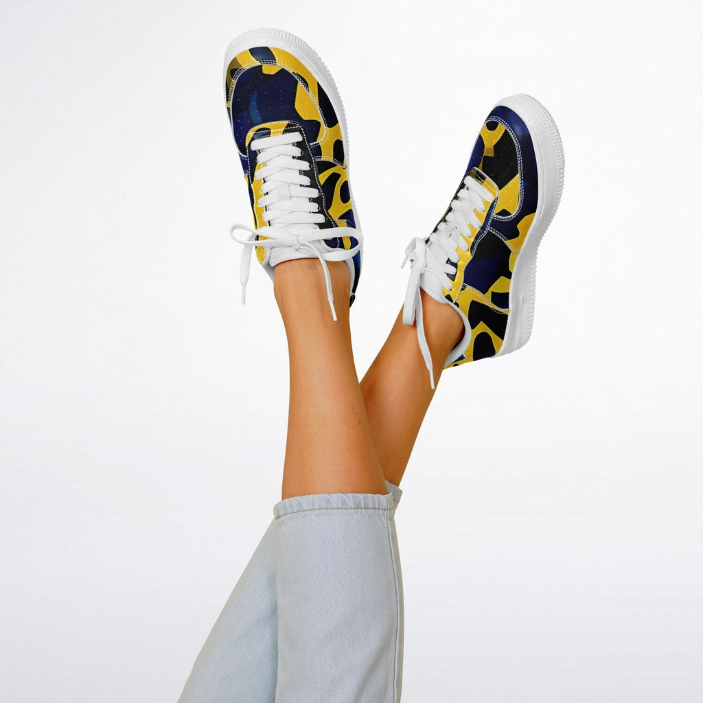 Vibrant Leopard Sneakers, low top sneakers with bold blue and yellow leopard pattern, on someone's feet.