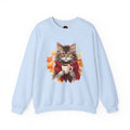 Autumn Kitty Crewneck Sweatshirt image: A cat graphic wearing a scarf and holding a hot drink, positioned within a design of fall leaves.