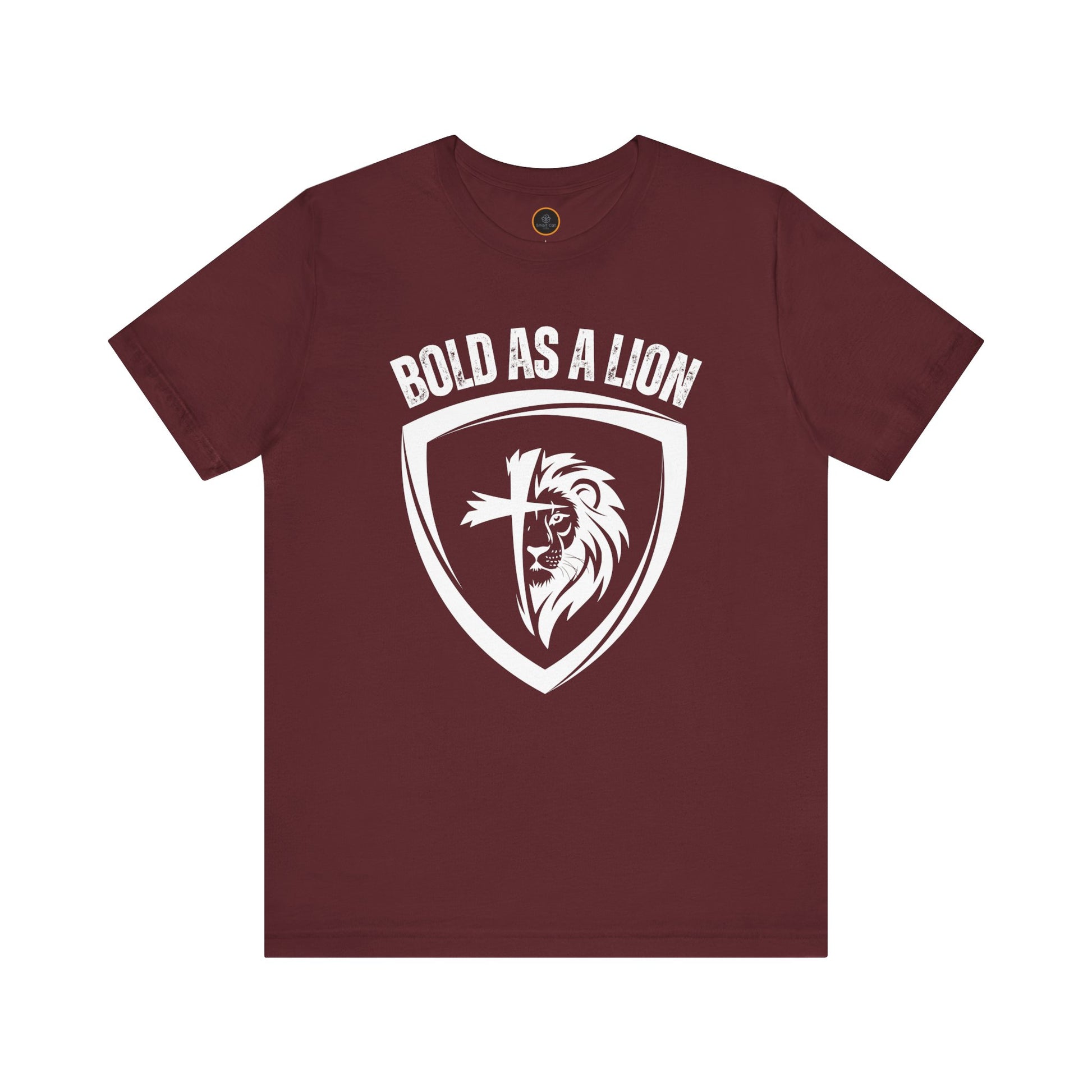 The Bold As A Lion t-shirt: Featuring a graphic with half of a lion's face merging into half of a cross within a shield outline. The text "bold as a lion" is printed above the graphic.