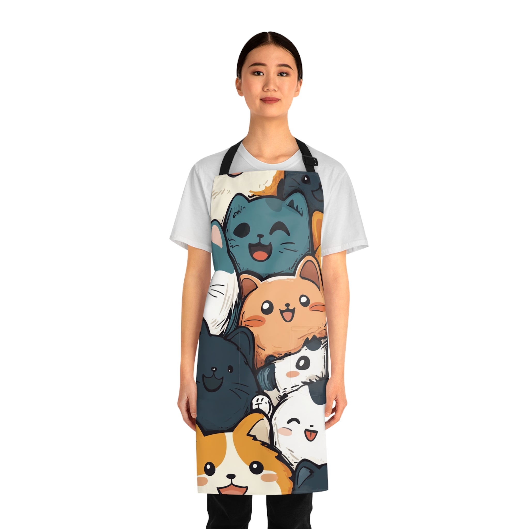 Woman wearing a colorful apron with cartoon cat designs