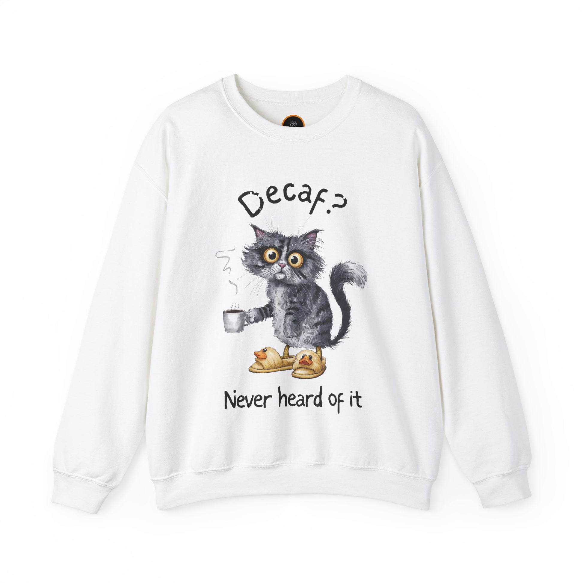 A sweatshirt featuring an exhausted-looking cat wearing yellow slippers with duck faces on them. The cat is holding a steaming mug of coffee. The text on the sweatshirt reads "Decaf? Never Heard of It."
