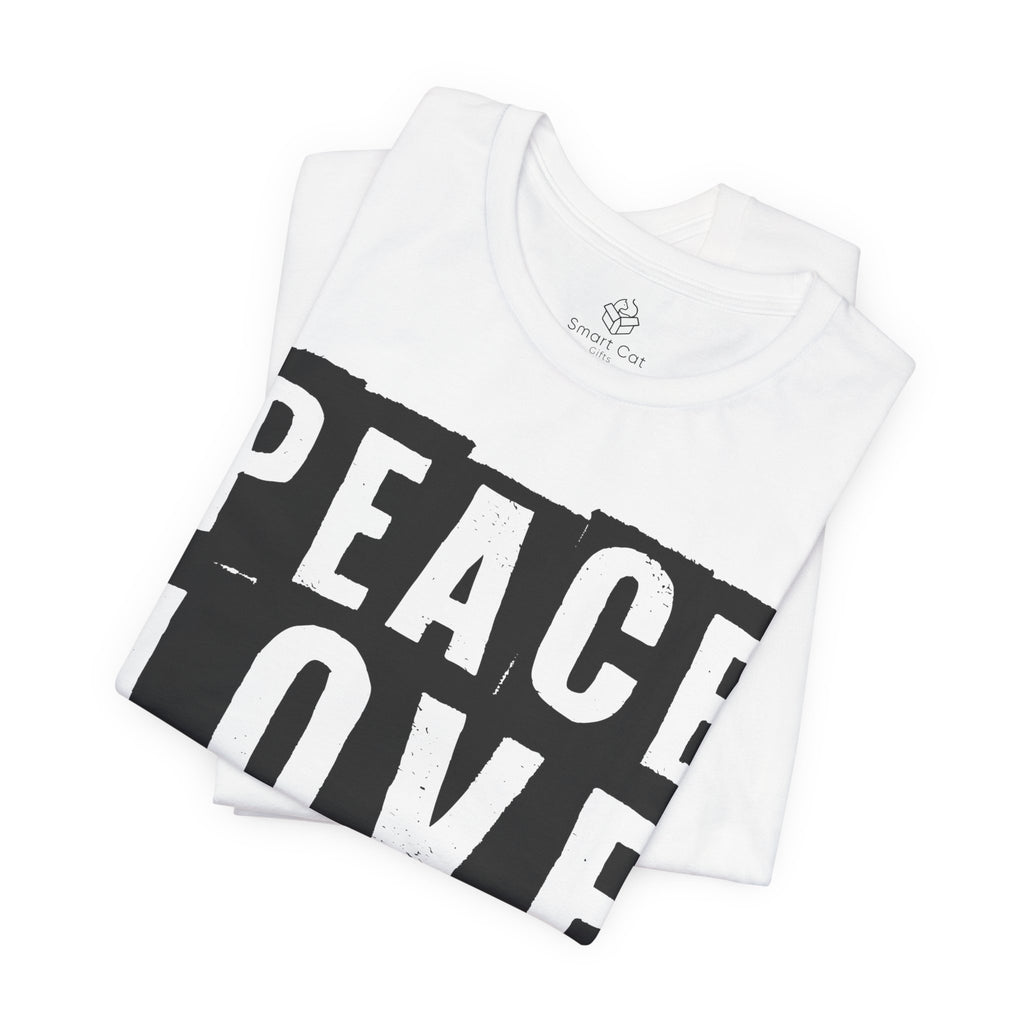 A white crew neck t-shirt with the text 'PEACE LOVE RESCUE' on it.