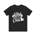 Black crew neck t-shirt with a cat graphic, paw graphics and the text 'Yes I Really Need All These Cats' printed on the front.