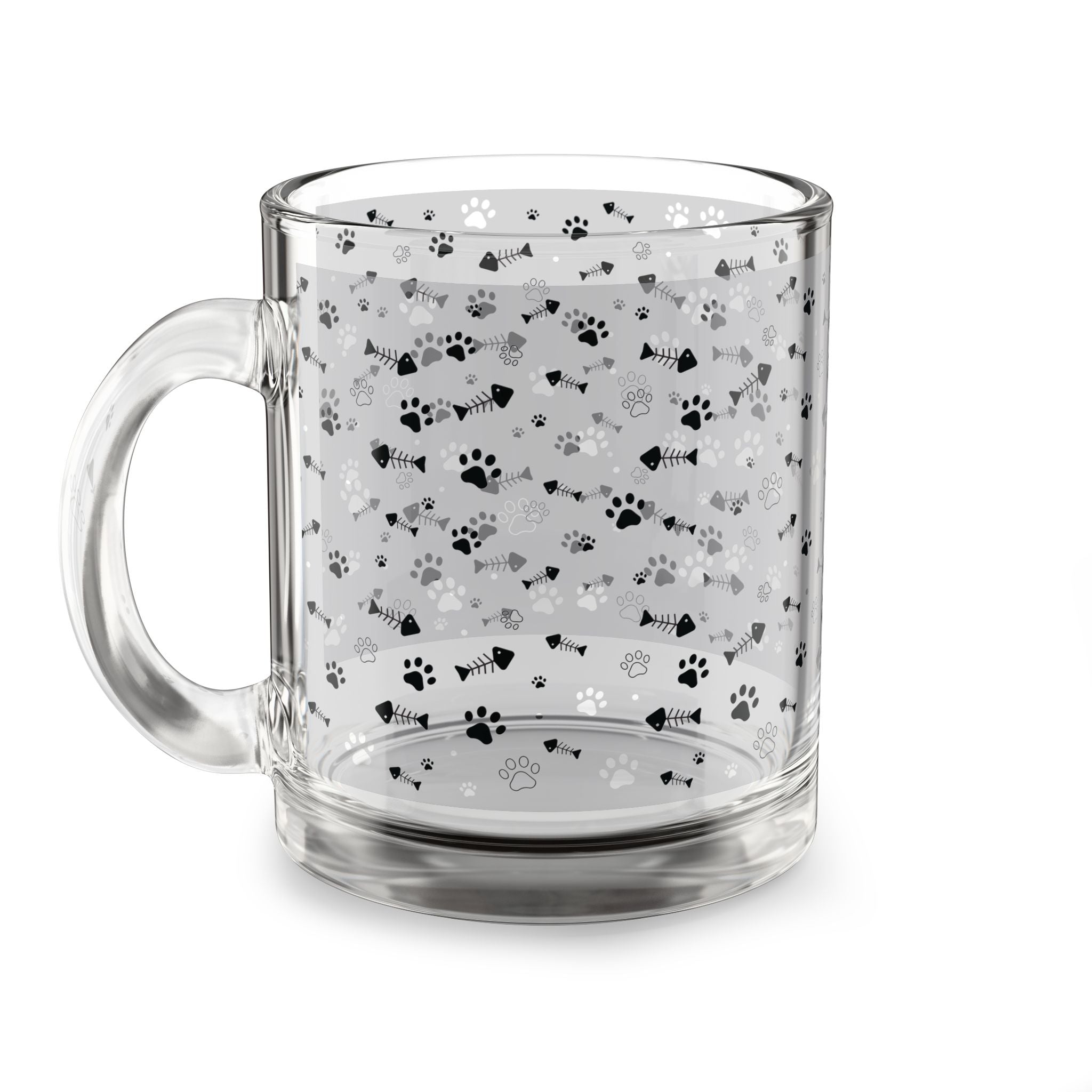 Clear glass mug with paw prints and fishbones all over print pattern.