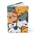 White Kawaii Party Hardcover Journal slightly opened with colorful cat party graphic.
