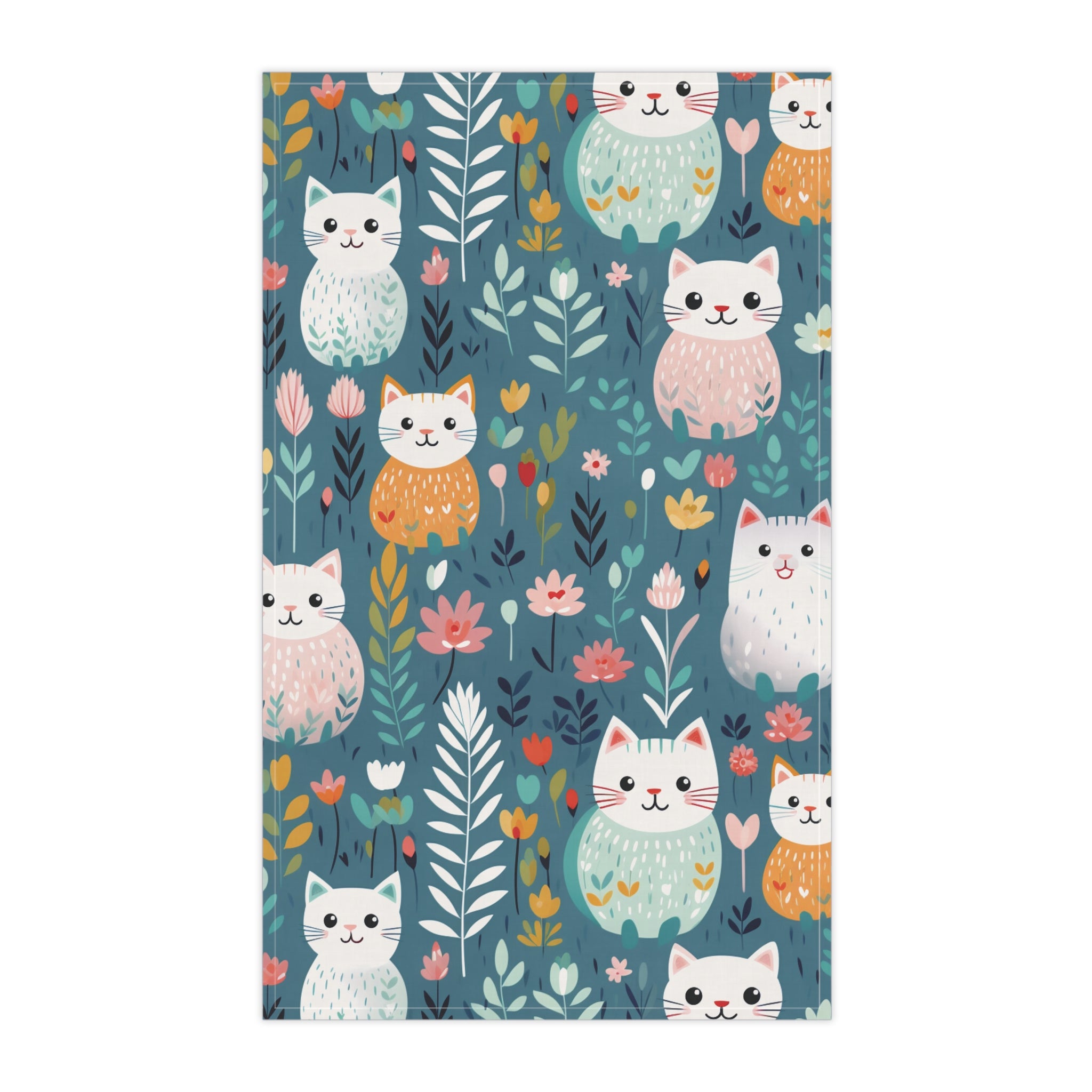 Image of the teal colored Flower Kitty tea towel with a graphic of smiling cats surrounded by flowers.