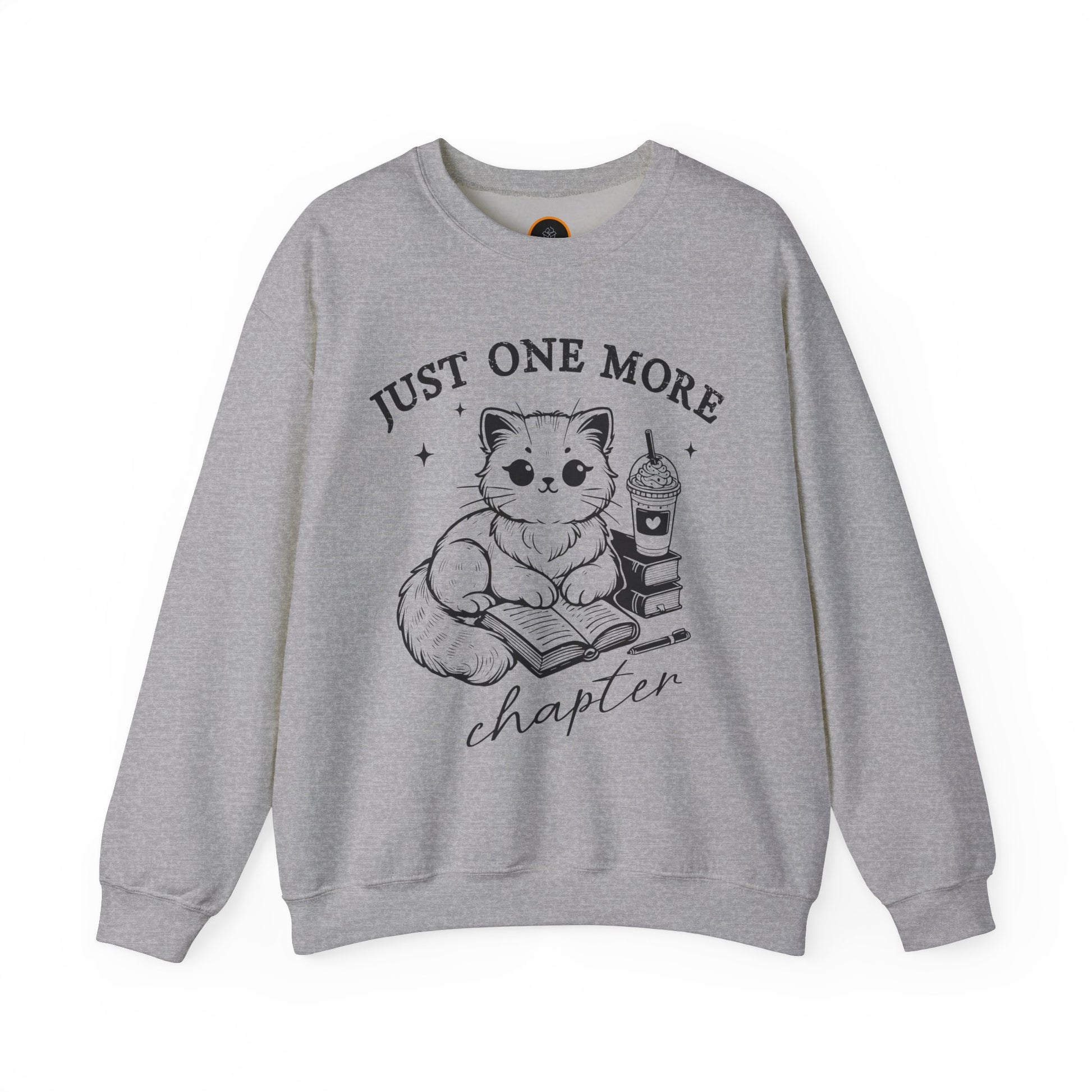 Just One More Chapter" light gray crewneck sweatshirt with a graphic of a cat reading a book next to a Frappuccino on a stack of books.