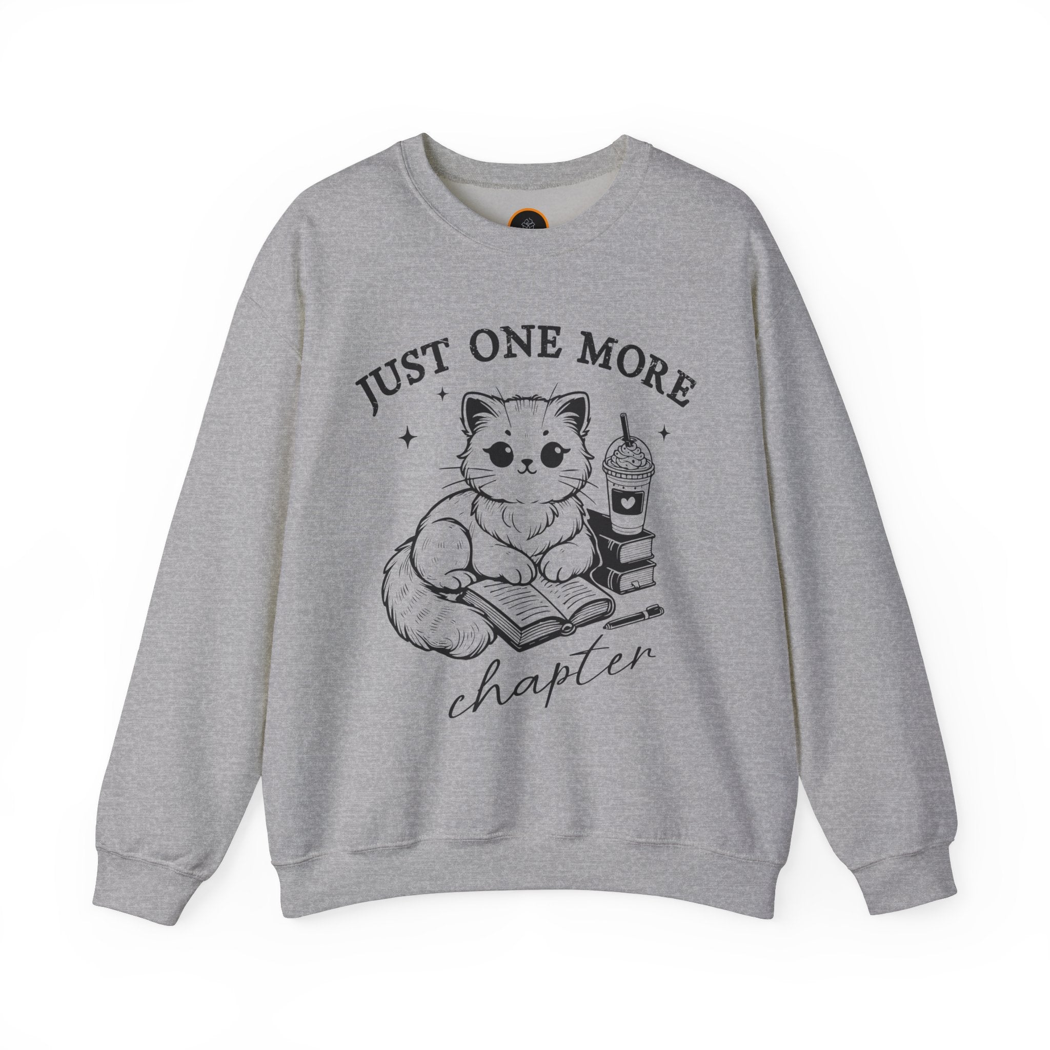 Just One More Chapter" light gray crewneck sweatshirt with a graphic of a cat reading a book next to a Frappuccino on a stack of books.