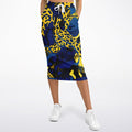 A long athletic skirt with vibrant leopard print and blue color, featuring side pockets and a drawstring closure.