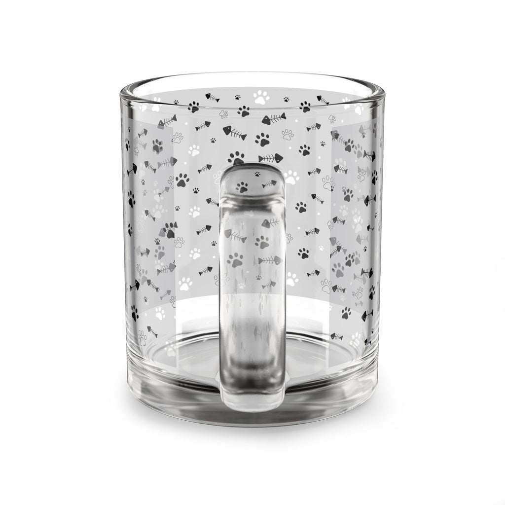 Clear glass mug with paw prints and fishbones all over print pattern.