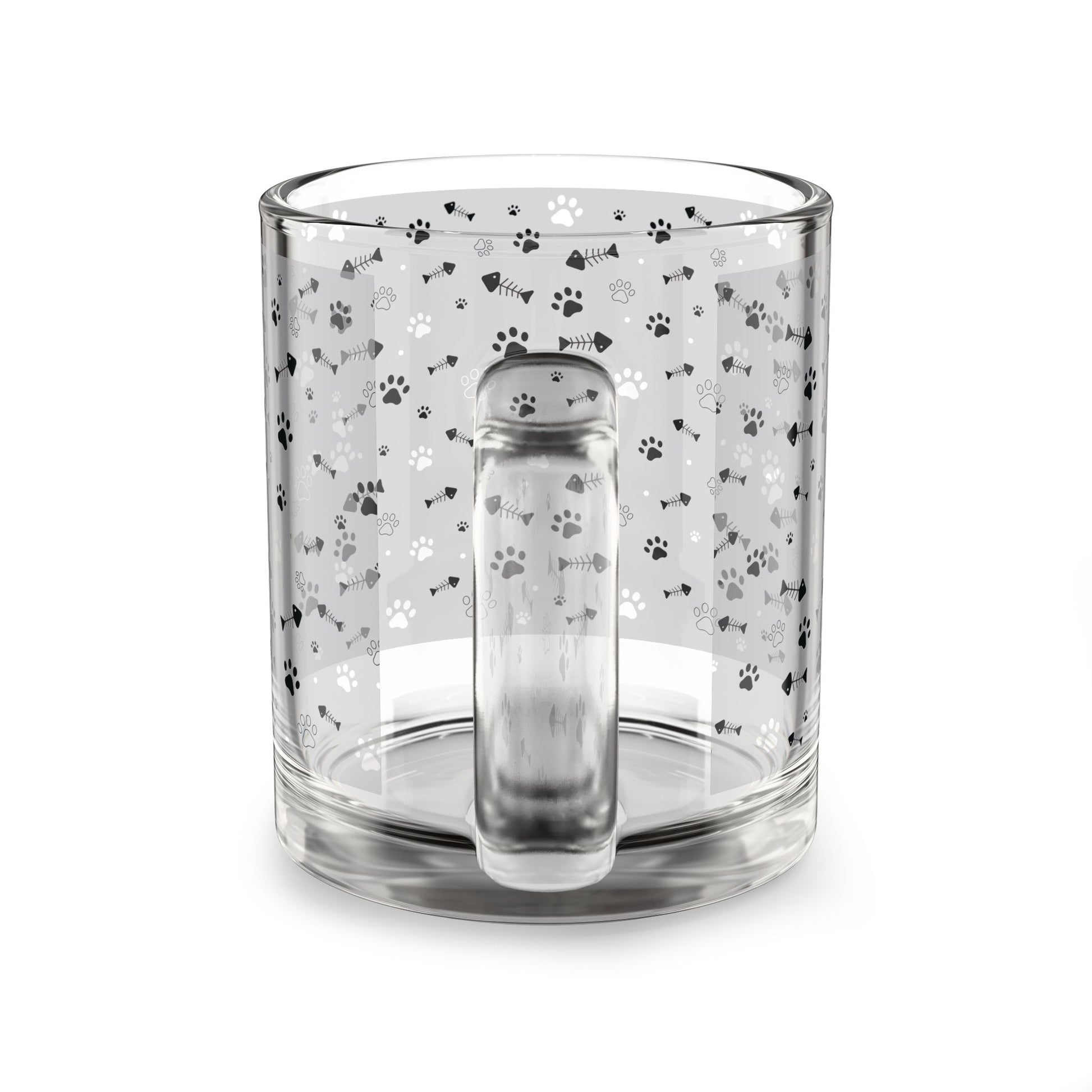 Clear glass mug with paw prints and fishbones all over print pattern.