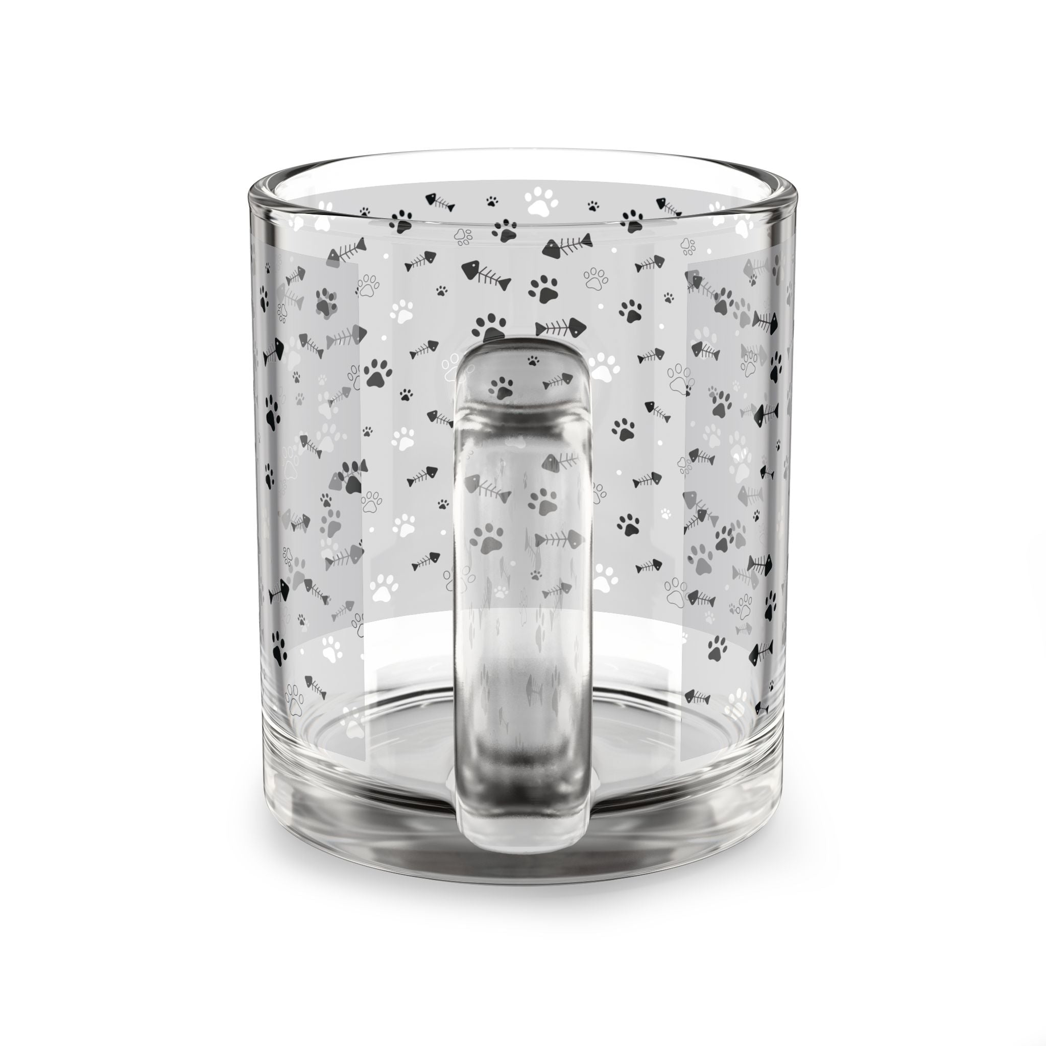 Clear glass mug with paw prints and fishbones all over print pattern.