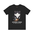 Black t-shirt with a graphic of a frustrated cartoon cat standing over spilled coffee. Text below the cat reads "Opposable Thumbs Are Highly Overrated".