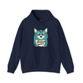 Navy blue "Staring and Waiting" Hoodie: Features a cartoon graphic of a wide-eyed cat on the front, with the text "staring and waiting" written across its belly.