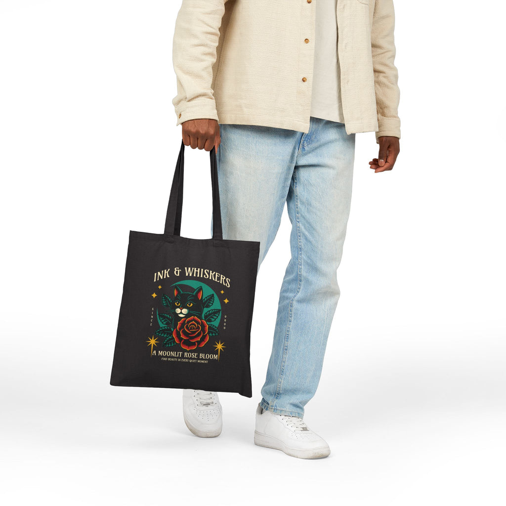 Black cat with red rose and gold stars tattoo art tote bag, Ink and Whiskers design on black canvas