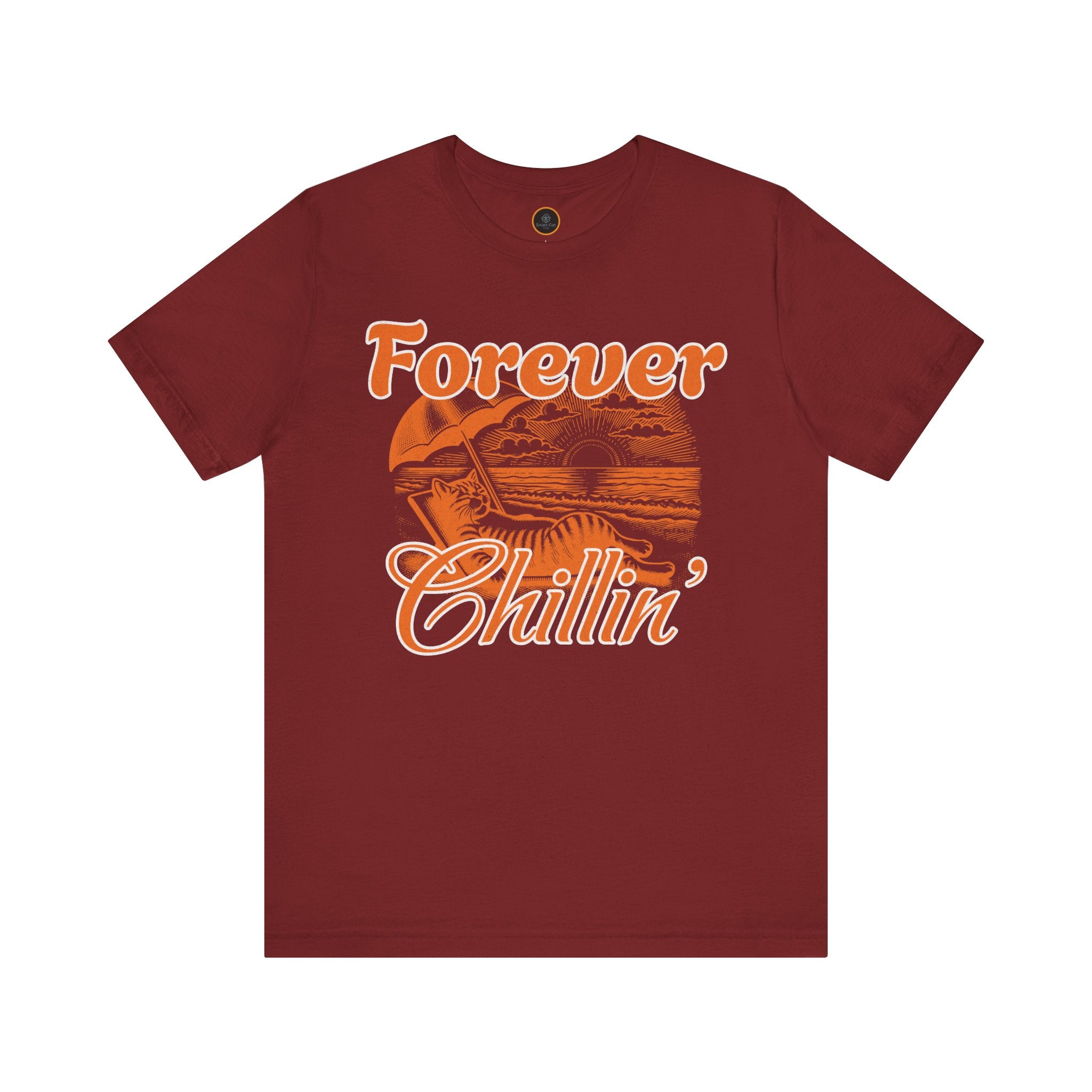 A graphic on the "Forever Chillin'" T-shirt shows a relaxed cat lounging in a beach chair on a sandy beach, with ocean waves and a setting sun visible in the background.