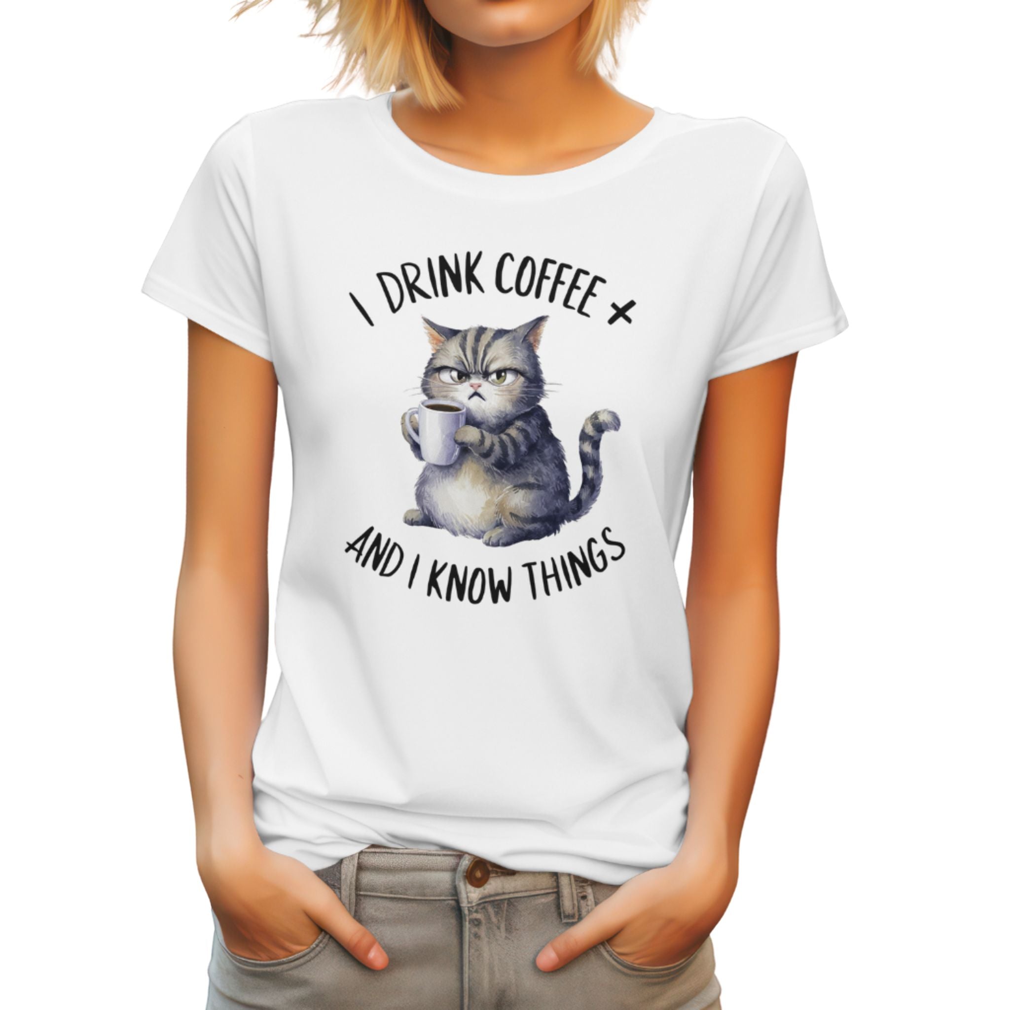 A woman wearing a white crew neck t-shirt with the text 'I DRINK COFFEE AND I KNOW THINGS' and an illustration of a grumpy cat holding a coffee cup.