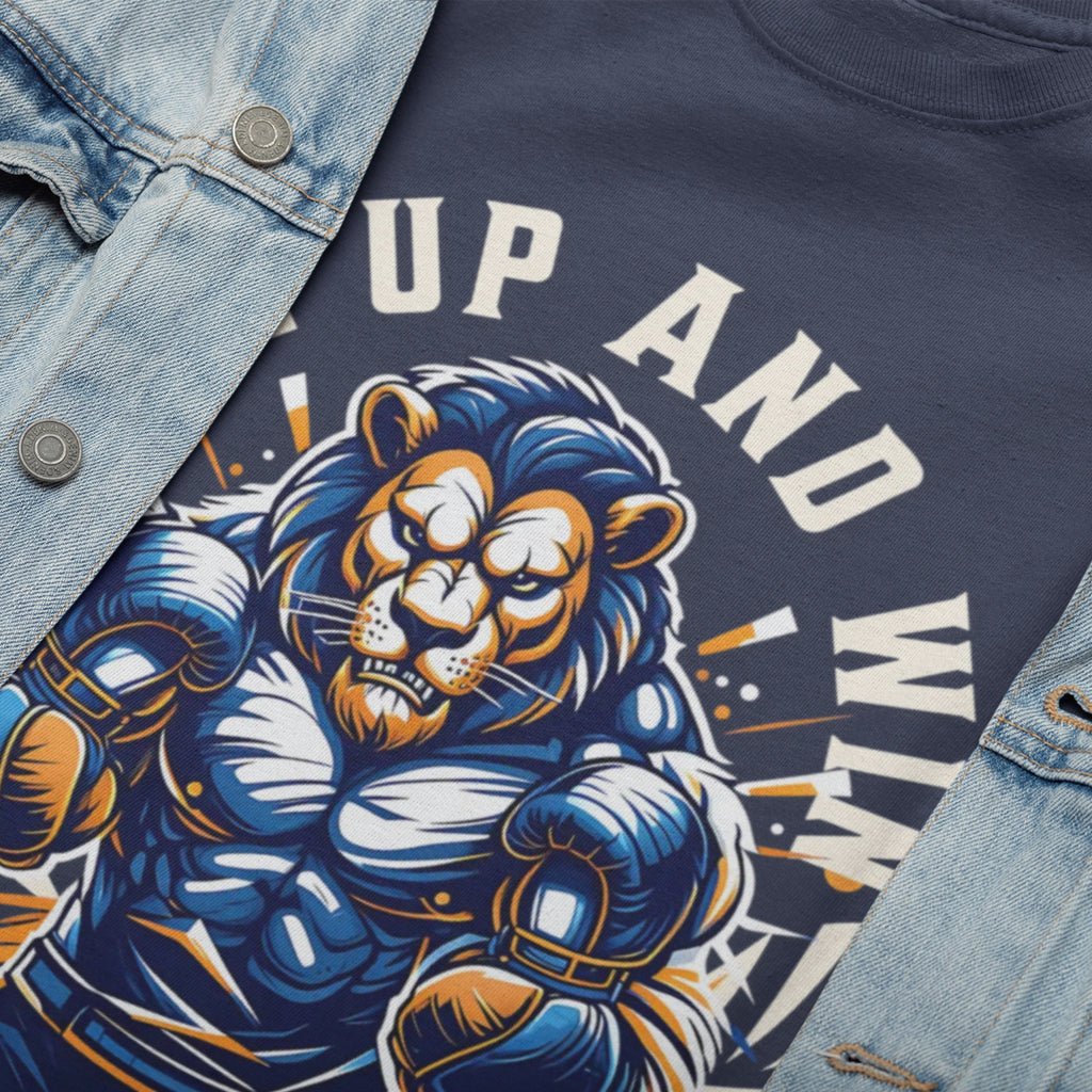 Blue denim jacket and navy t-shirt featuring a powerful lion graphic in a ready-to-fight stance with inspiring 'Rise Up and Win' text.