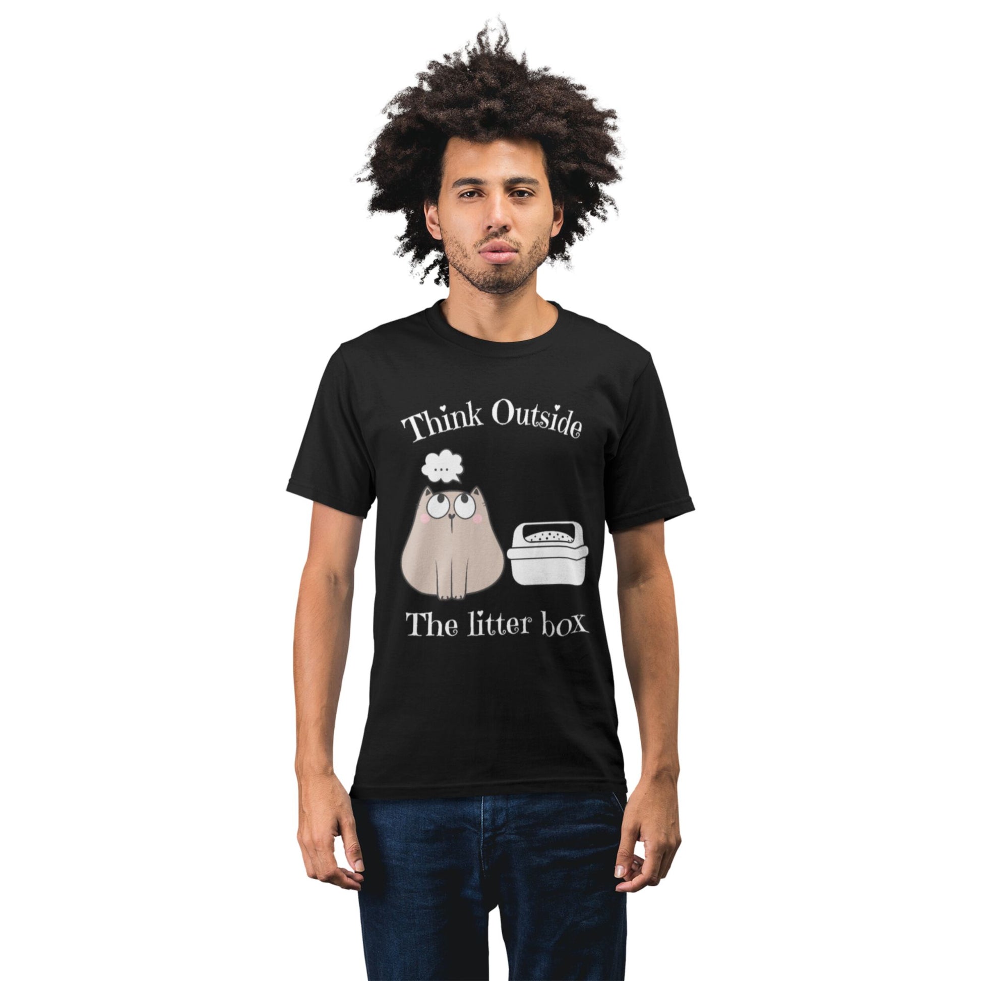 A person wearing a black crew neck t-shirt with the text 'Think Outside The Litter Box' and a graphic of a cat sitting next to a litter box. 