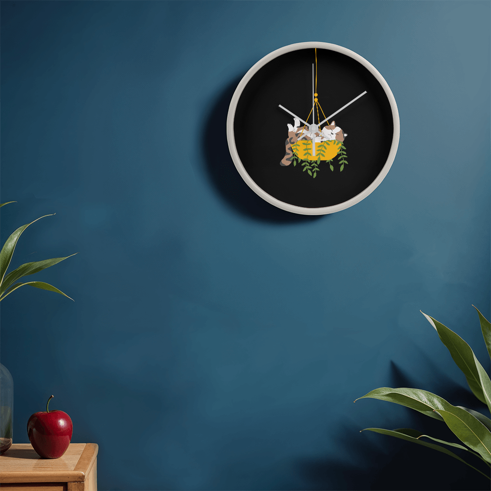 Colorful cartoon image of a cat sleeping in a hanging plant basket, imprinted on a 10" wood frame "Cozy Dozy Cat Nap" clock face.