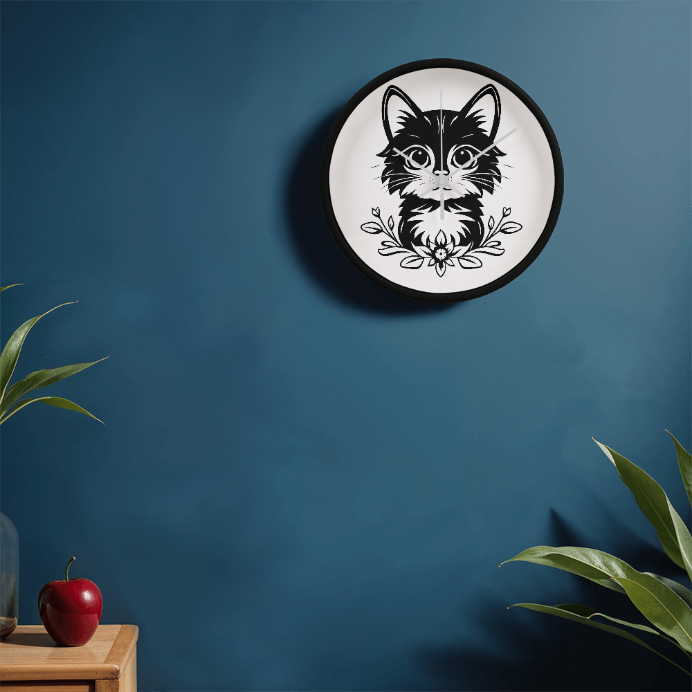Black and white line art of a kitten sitting among flowers on a 10" wood frame "Purfect Timing" clock.