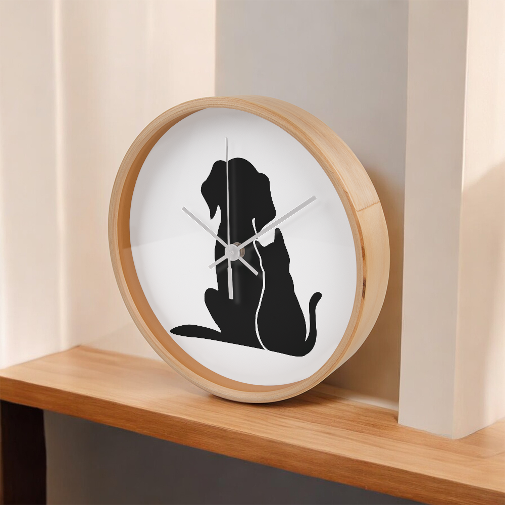 Silhouette of a cat and dog sitting closely together, depicted on the face of the "Unspeakable Bond" Wood Frame 10" Clock.
